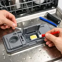 Ako opraviť dávkovač pracieho prostriedku v umývačke riadu, keď sa neotvára alebo neuvoľní tabletu